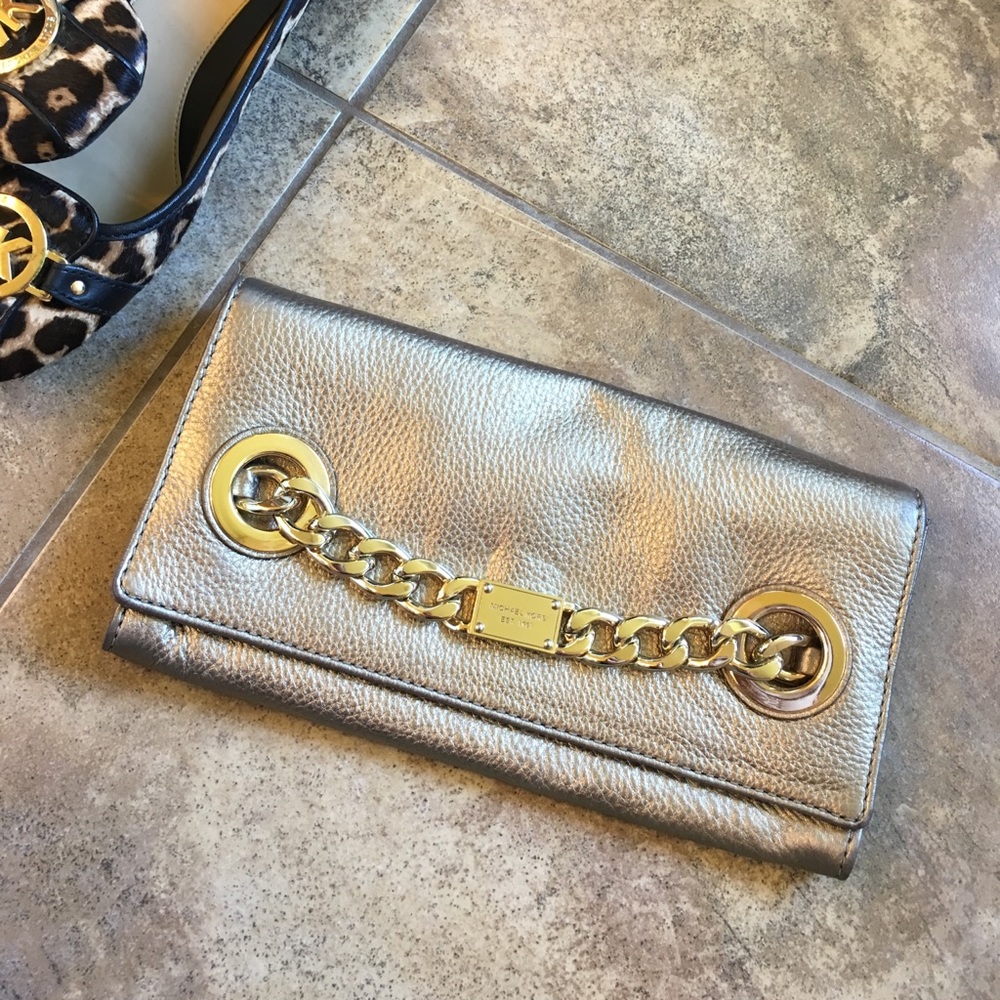 Michael Kors gold clutch