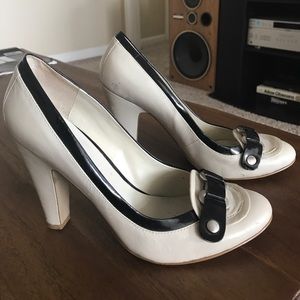 Ivory and black pumps