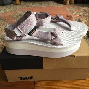 Never been worn Teva platform sandals. Size 7.