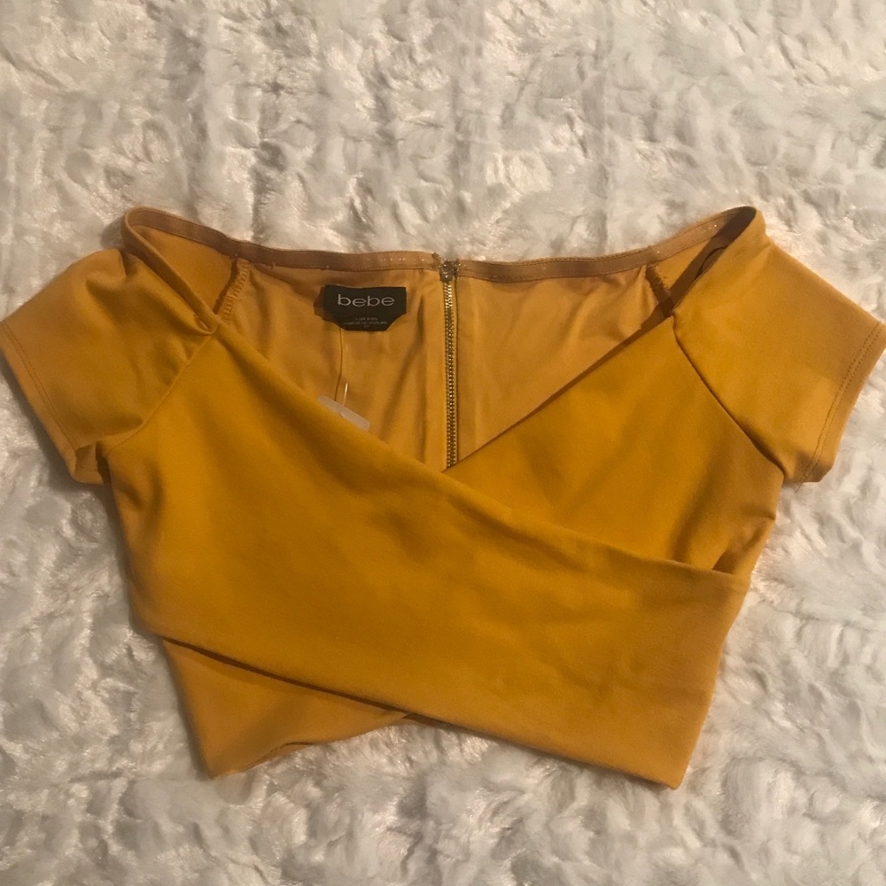 BEBE off shoulder criss cross crop top