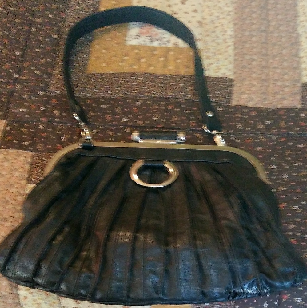 brand faux leather handbag with a kiss lock