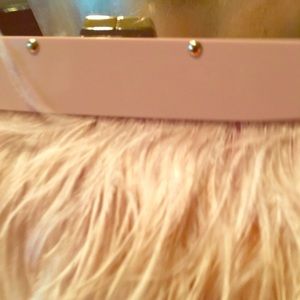 Bare pink small handbag made with ostrich feathers