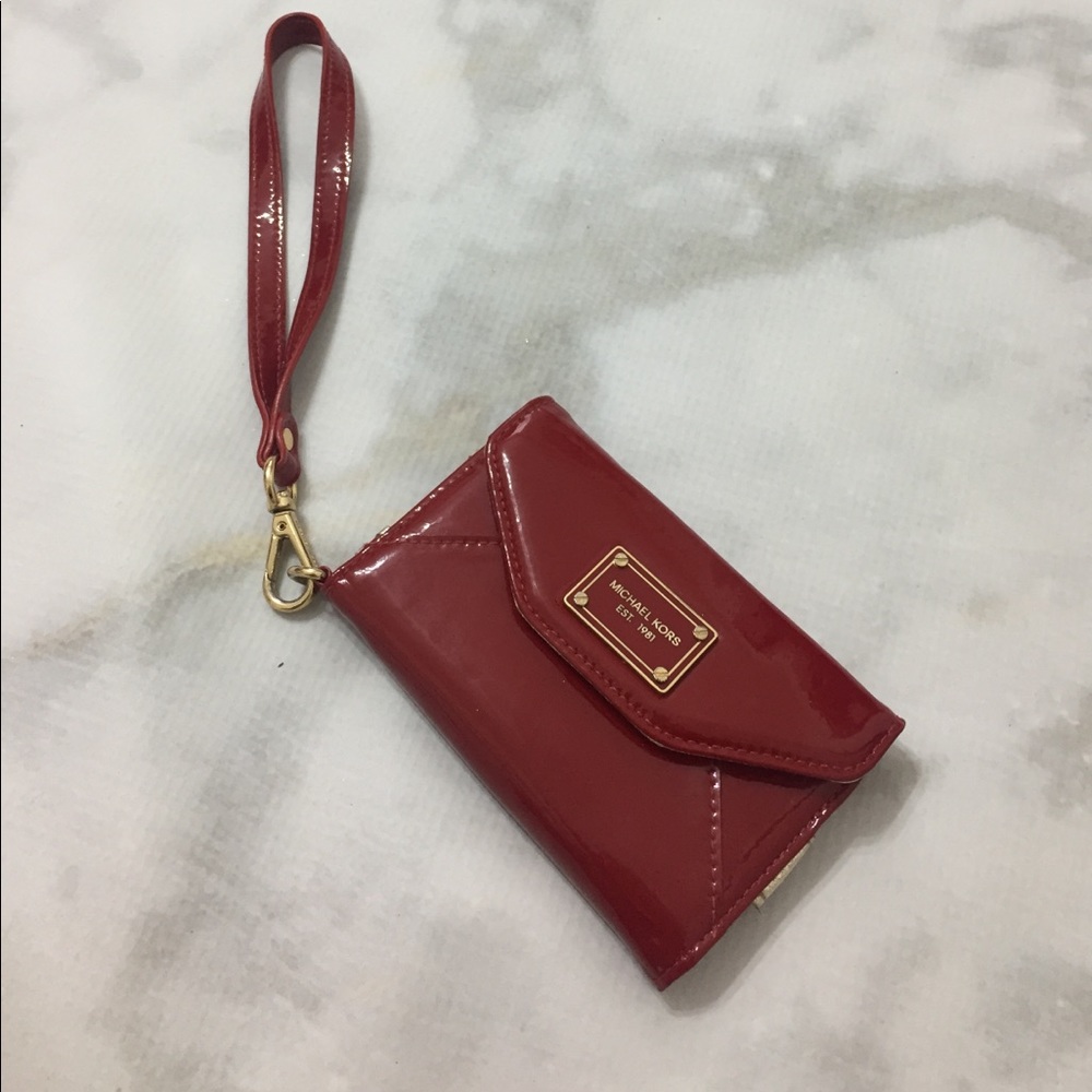 Authentic Michael Kors wristlet.