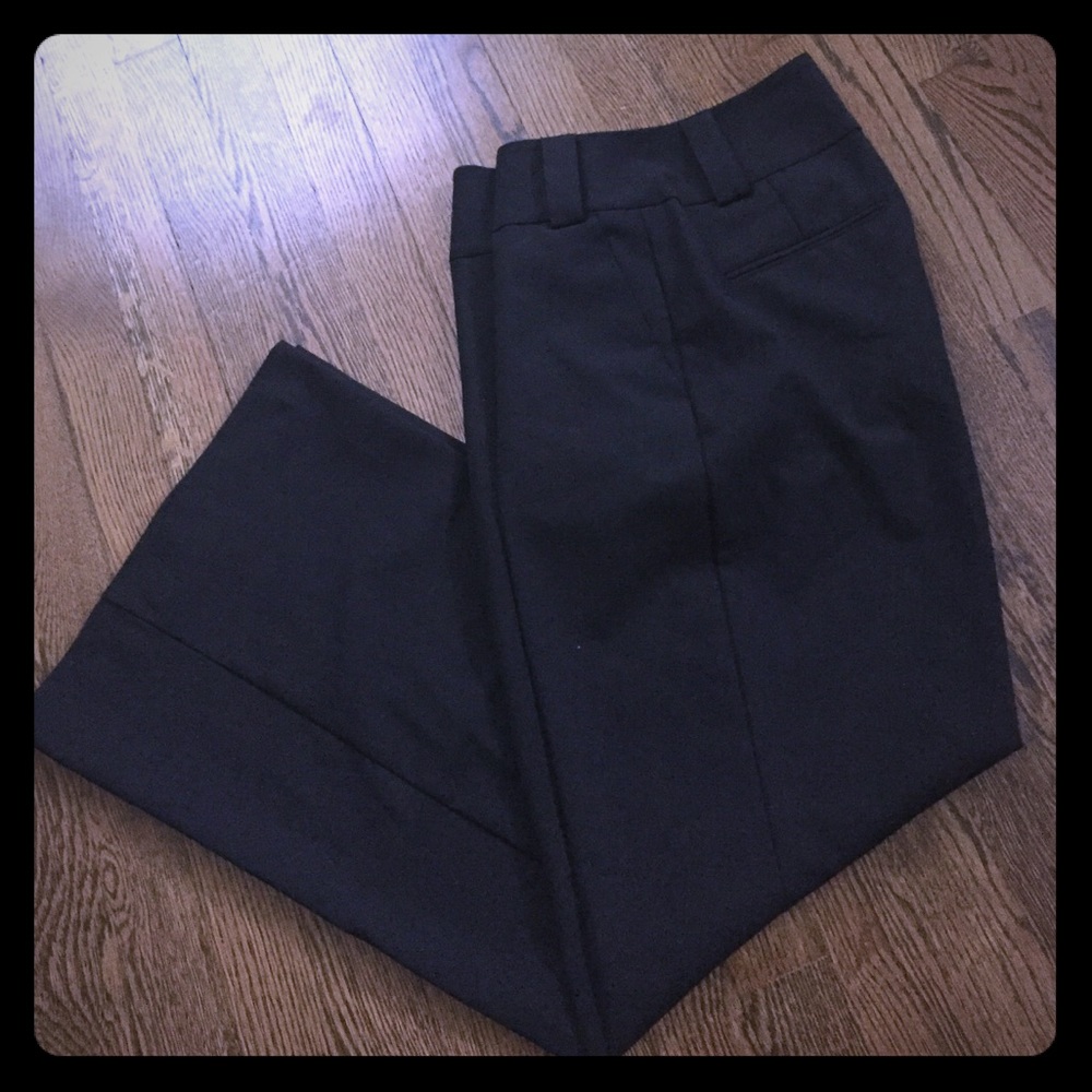High-waist, wide-leg black slacks