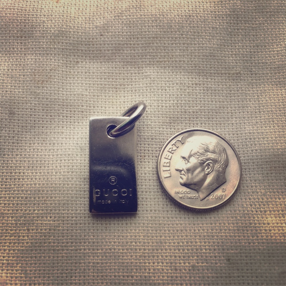 Gucci  silver charm