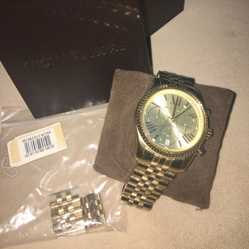 Large Michael Kors watch.