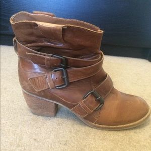 Light brown heeled booties w/ strap detail