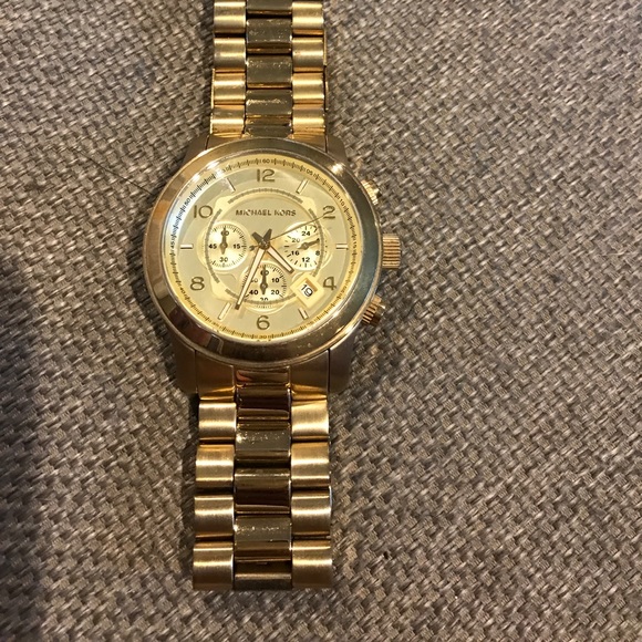 Michael Kors Gold Oversized Runway watch.