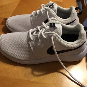 White Nike Roshe with black swoosh. 8.5