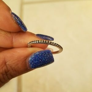 Silver ring with black stones