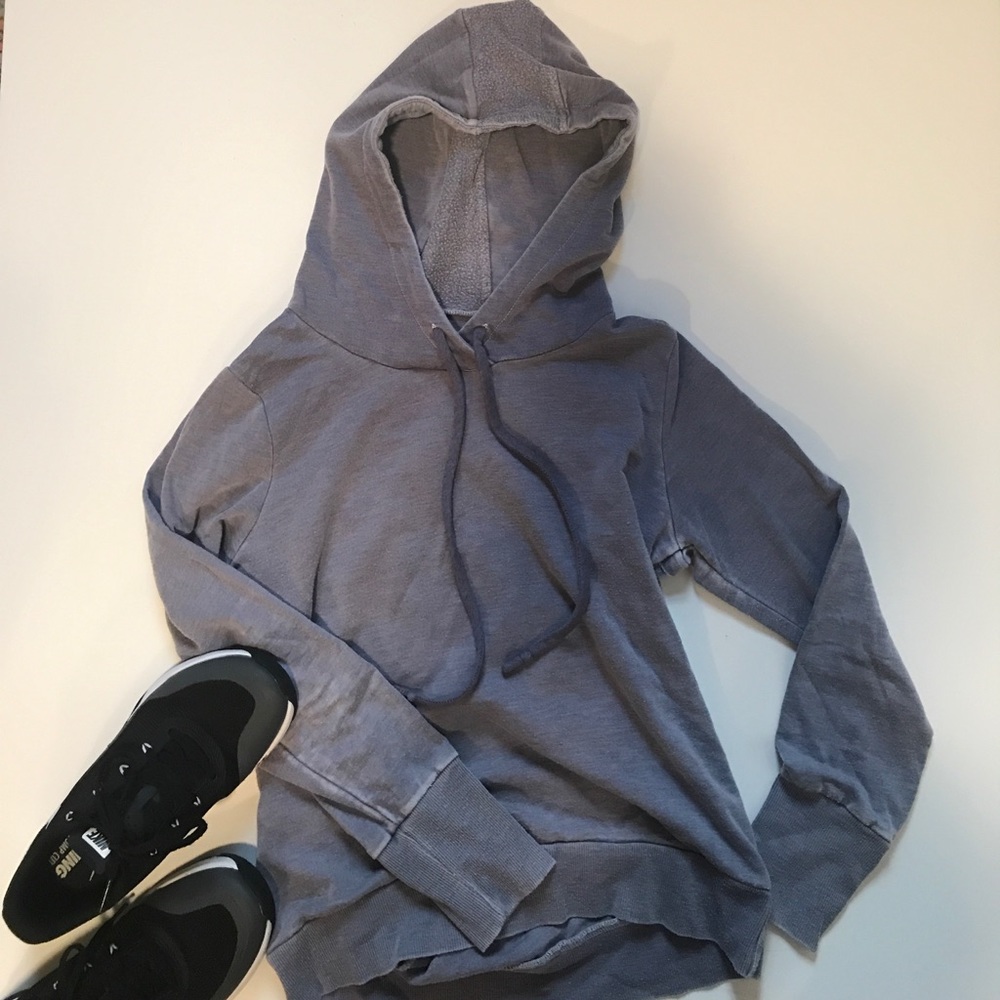 Light purple sweatshirt with ripped open back