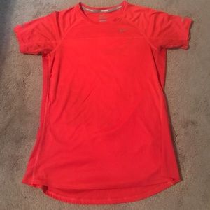 Bright pink/salmon color Nike Dri-Fit Run Top