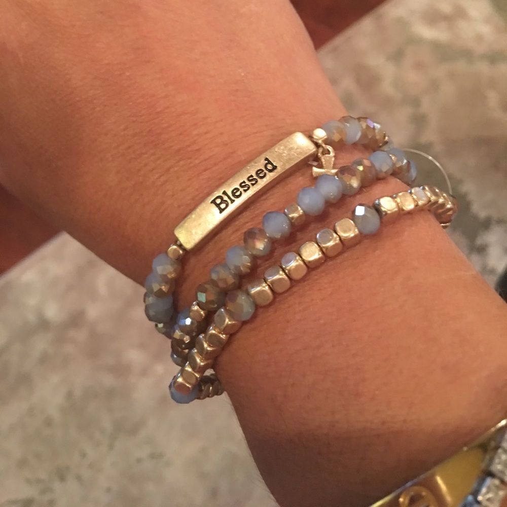 Blessed triple strand cross bracelet