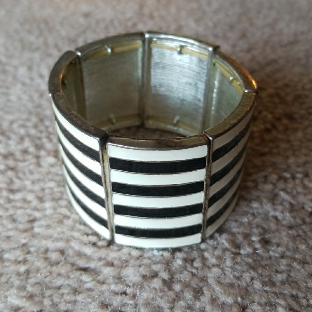 Black and white bars. Elastic bracelet.
