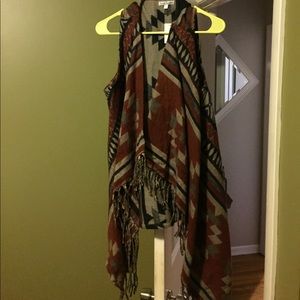 Open sleeveless sweater