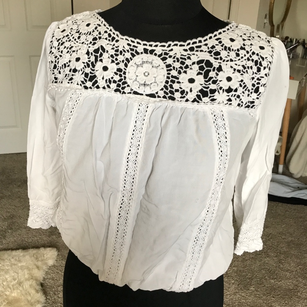 White blouse with crochet detail