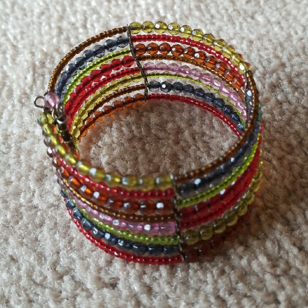 Plastic beaded bright colored bracelet.
