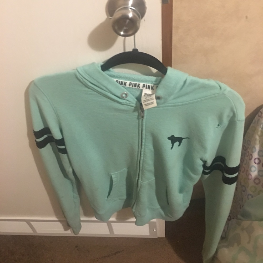 im selling this teal blue jacket