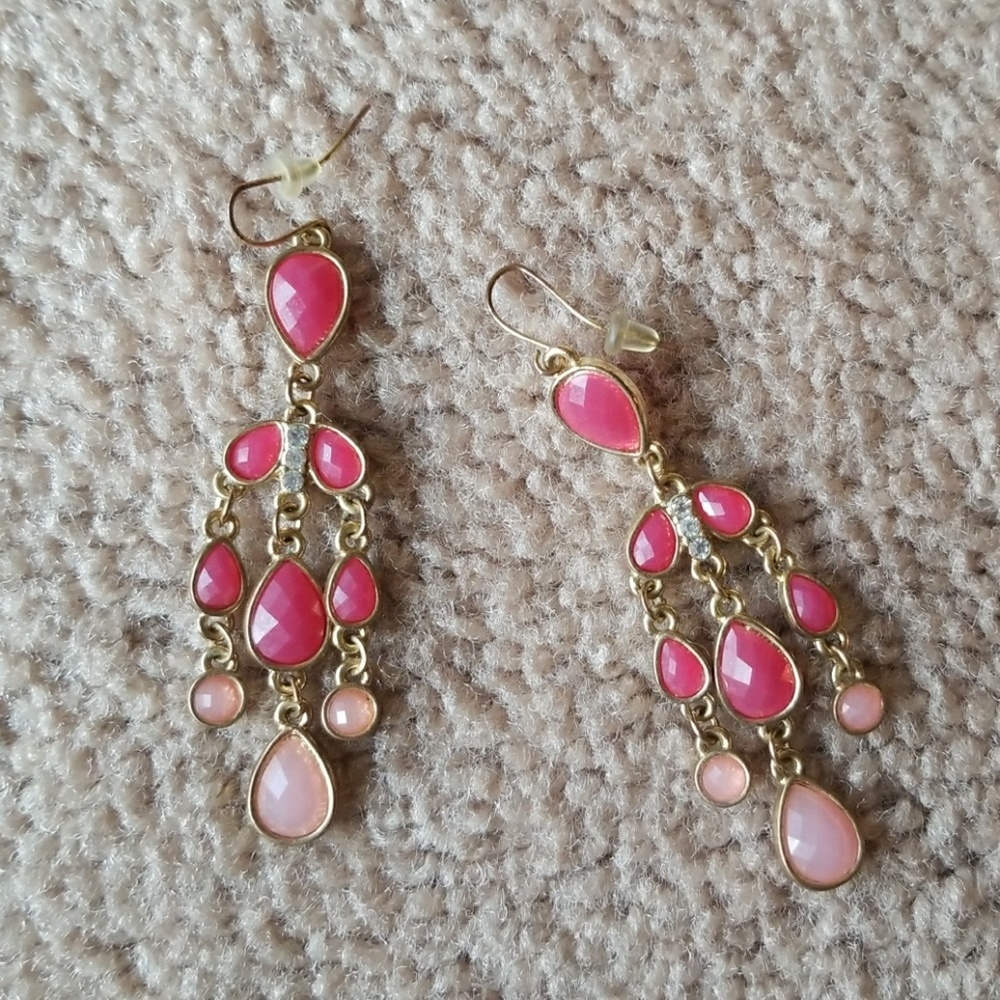 Pink and gold dangling earrings.