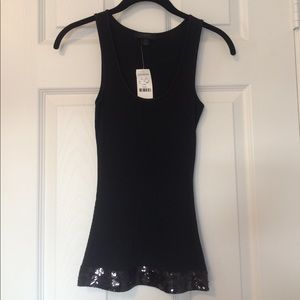 Black ribbed tank with sequin band.
