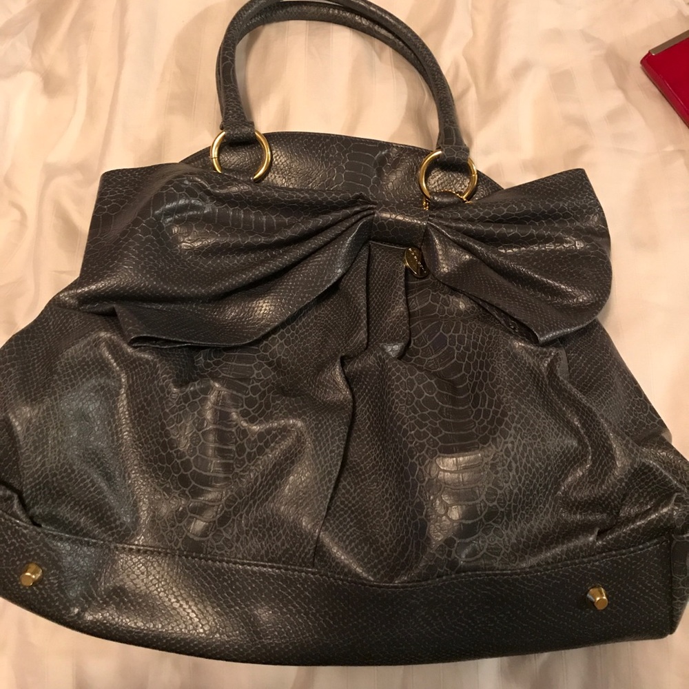 Grey purse with shoulder strap