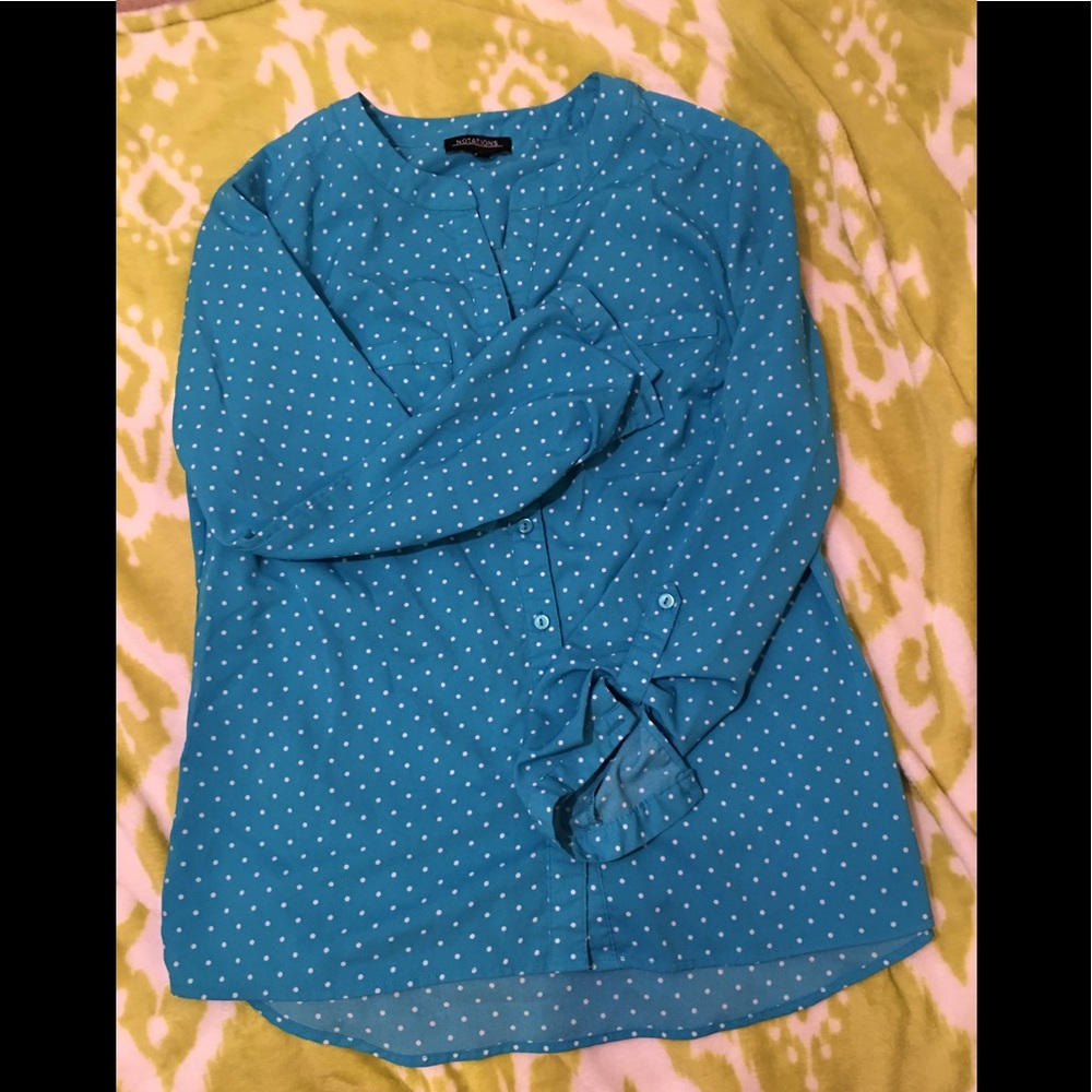 Super cute blue blouse with white polka dots!