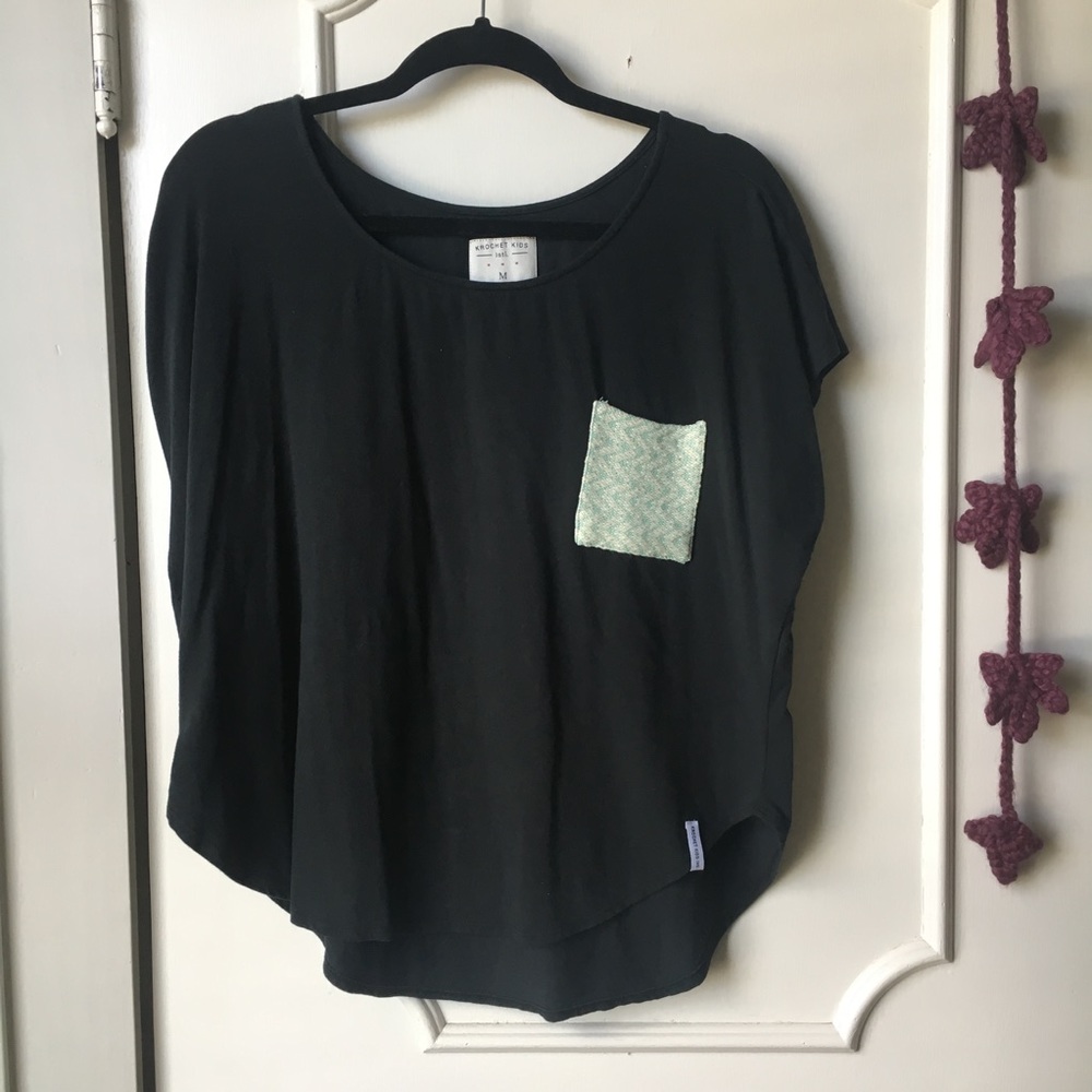 Krochet Kids stretchy flowy blouse with pocket