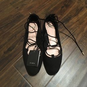 Lace up black flats