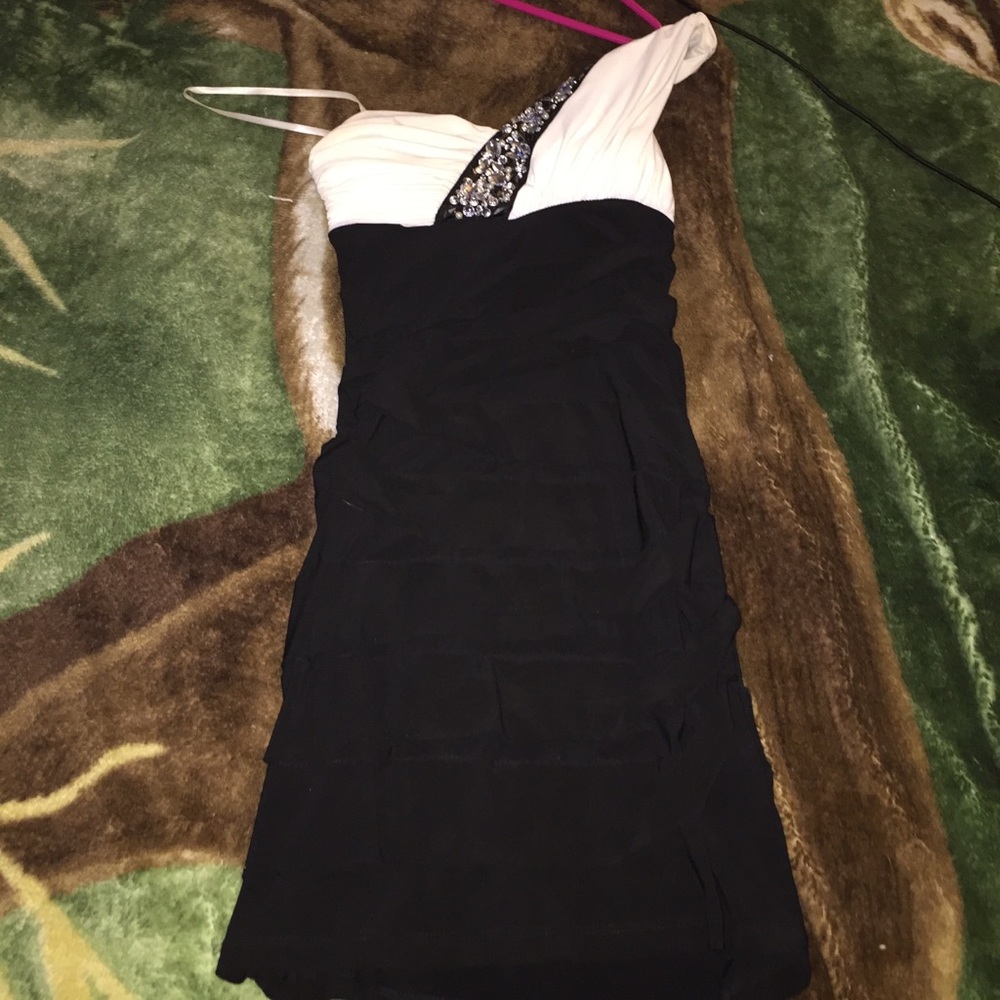 Black and white form fitting homecoming dress.