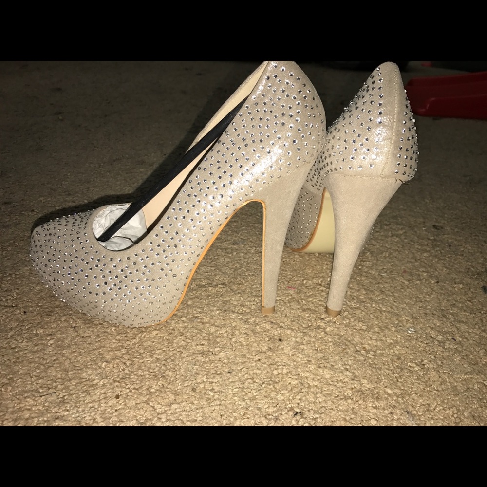 Size 8 1/2 sparkly beige heels.  Never worn