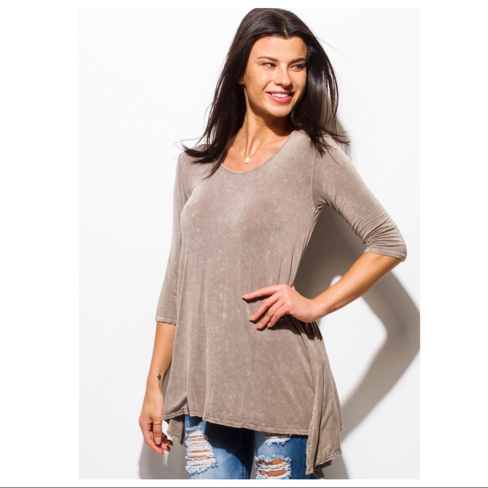 Acid wash knit top with side slit.