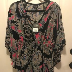 NWT,Beautiful flowy multi-colored and black shirt.