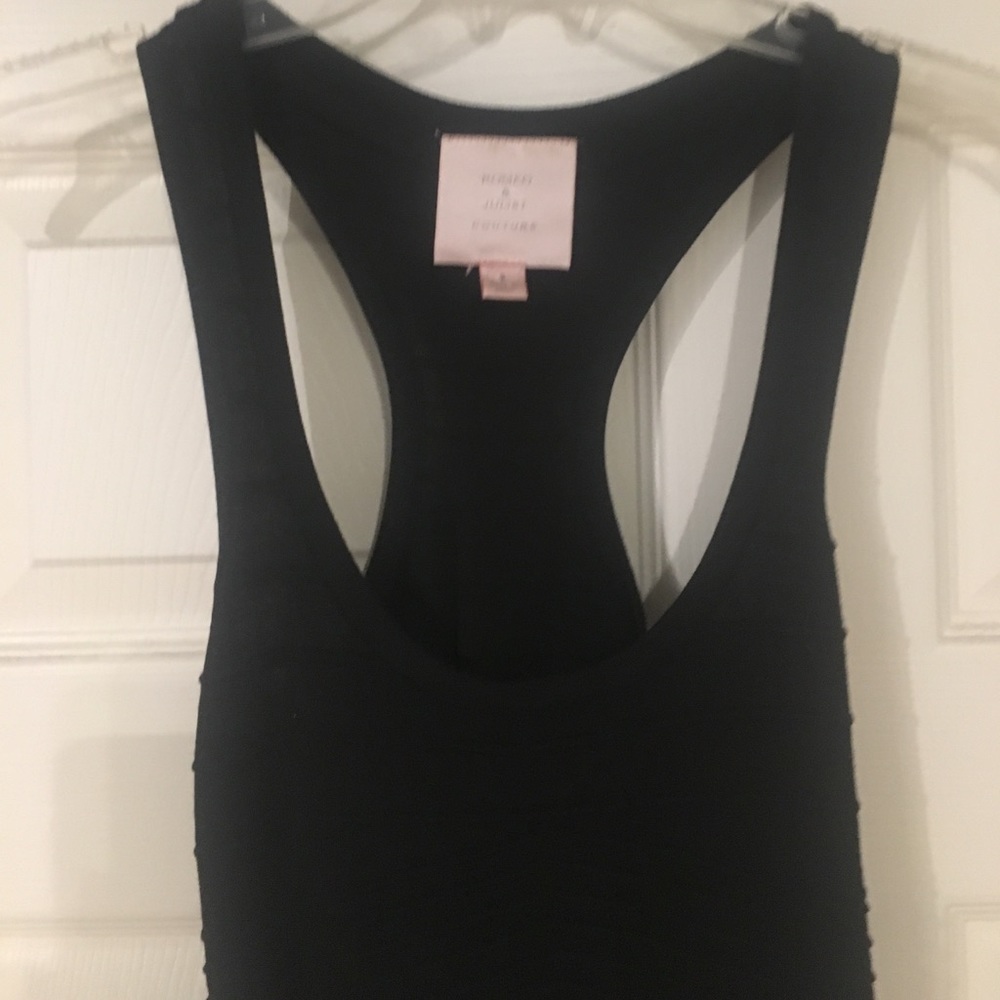 Tight black ribbed dress