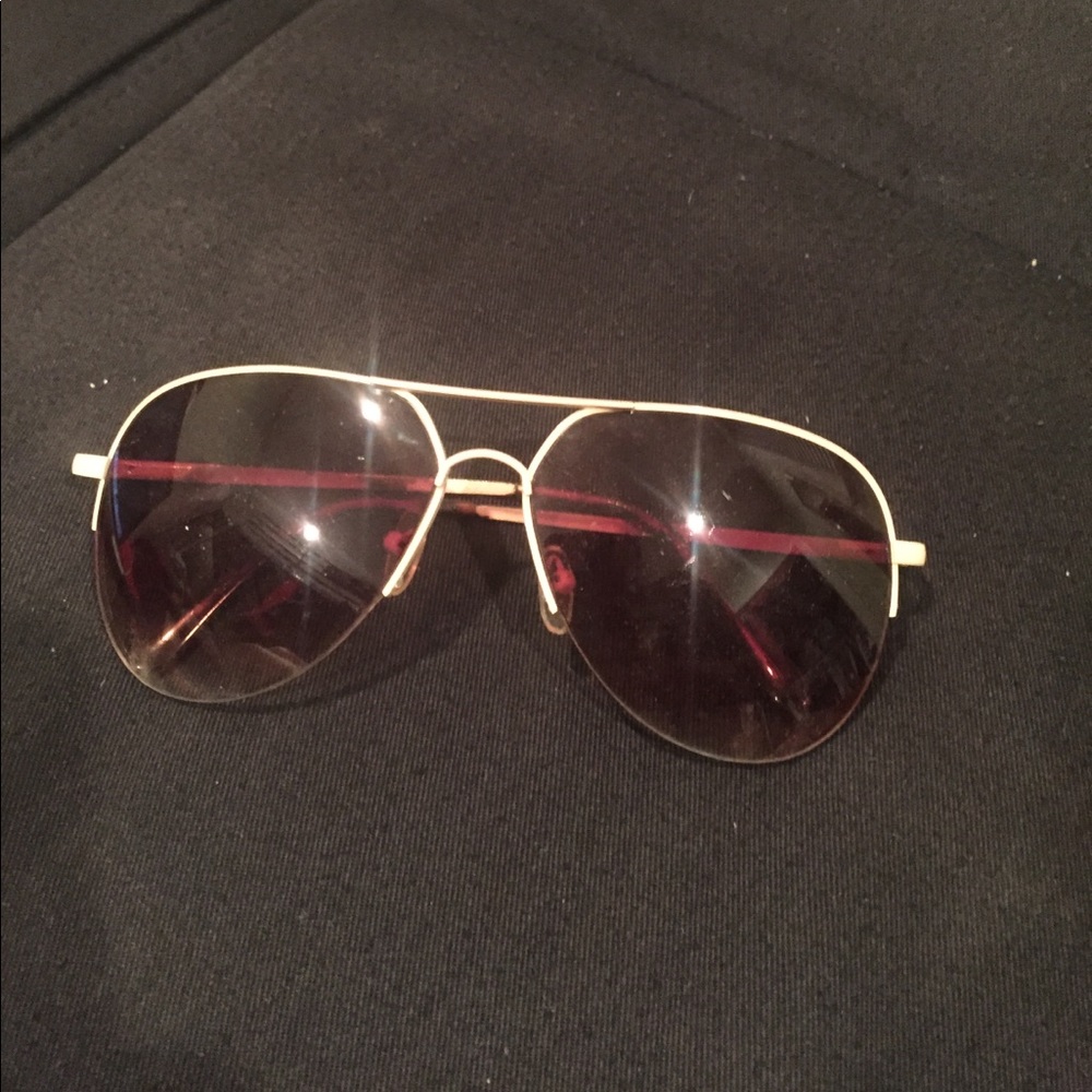 Pale pink rimmed aviators