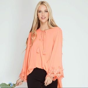 Orange/melon long-sleeve blouse