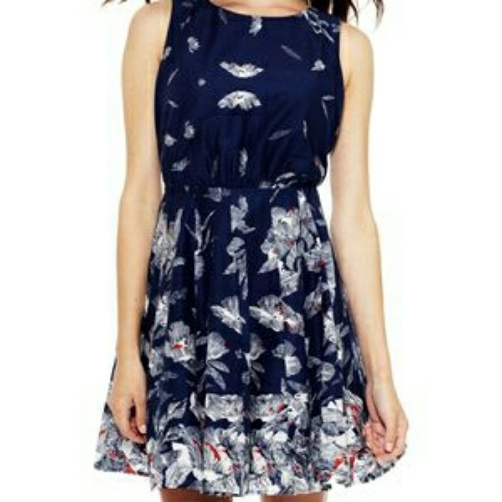 Navy blue dress with white/red design & open back.