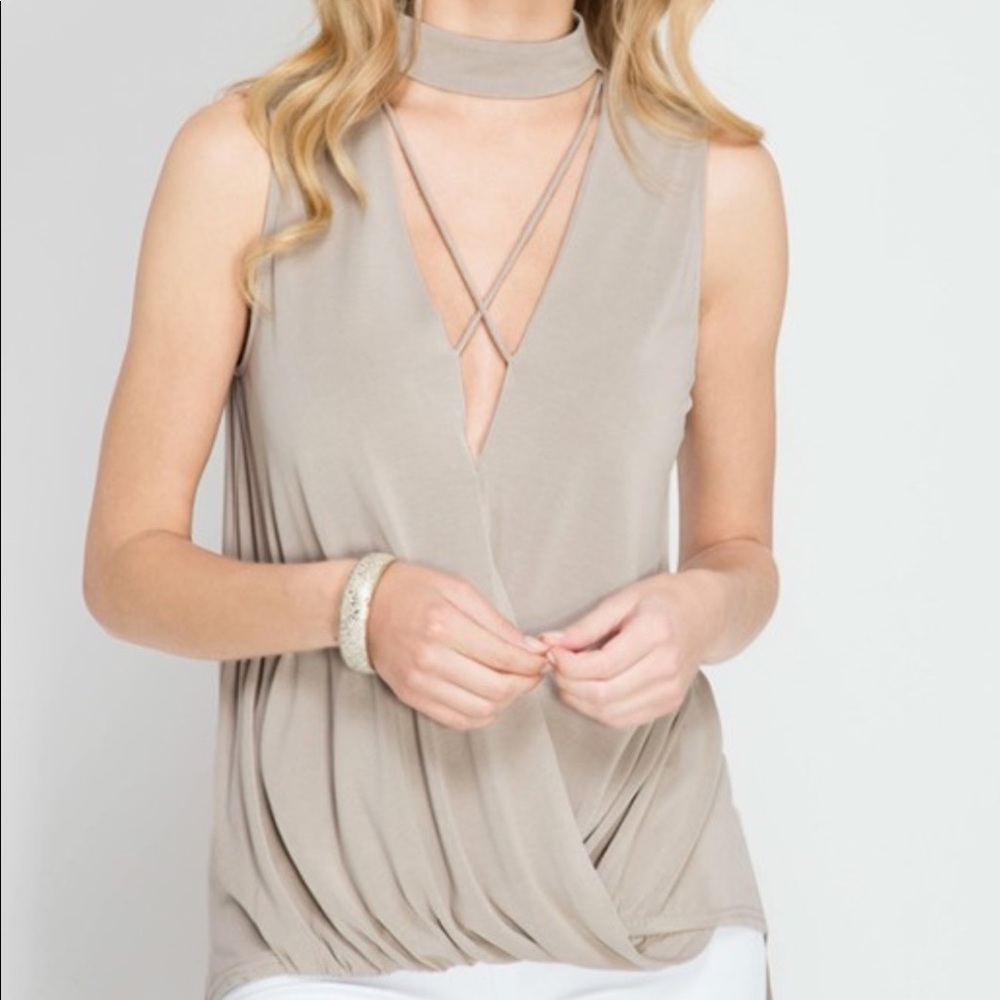 Tan sleeveless blouse