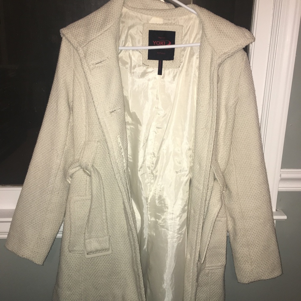 A white winter coat with a brand new silk inside.