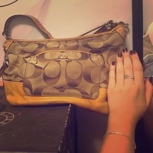 Slightly worn coach bag, fair condition