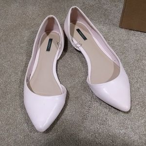 Light pink pointed flats