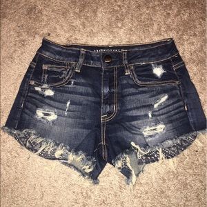 High waisted distressed jean shorts