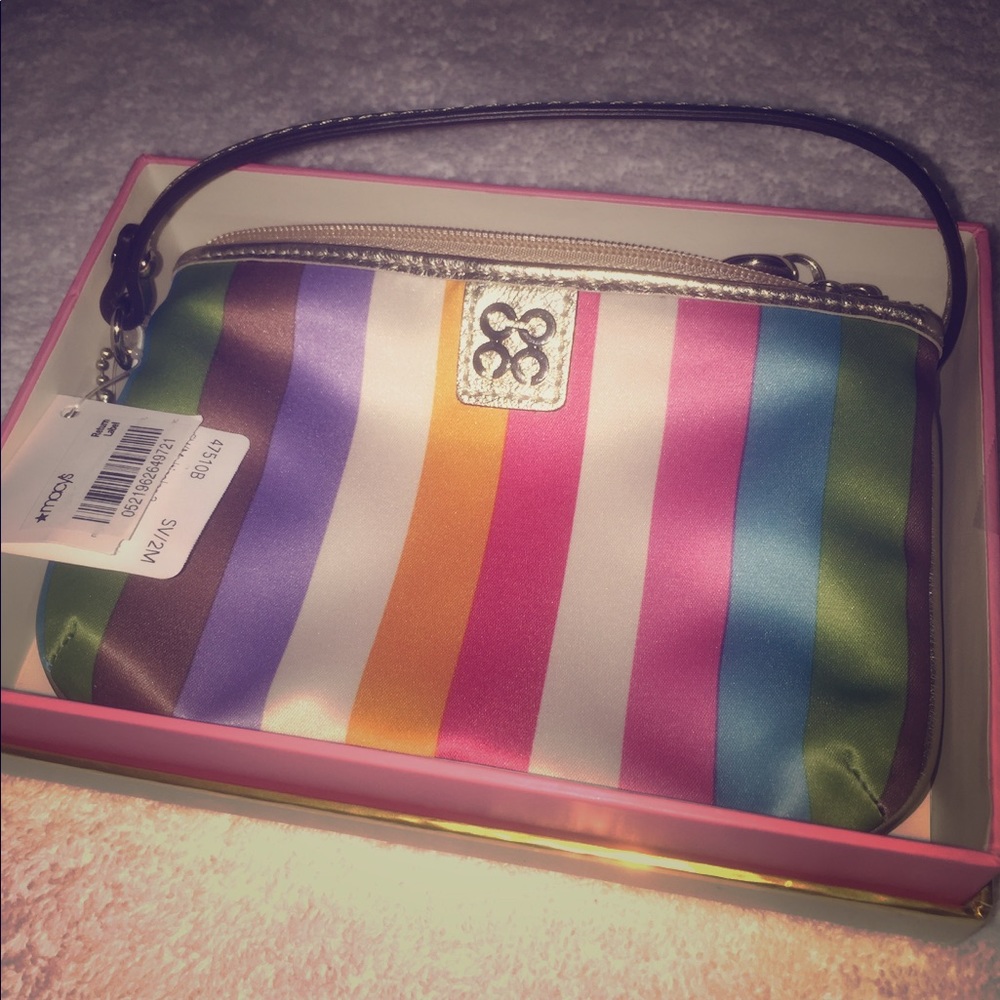 Brand new small coach hand bag.