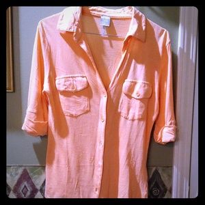 Pretty orange color top.