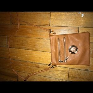 Tan cross body purse