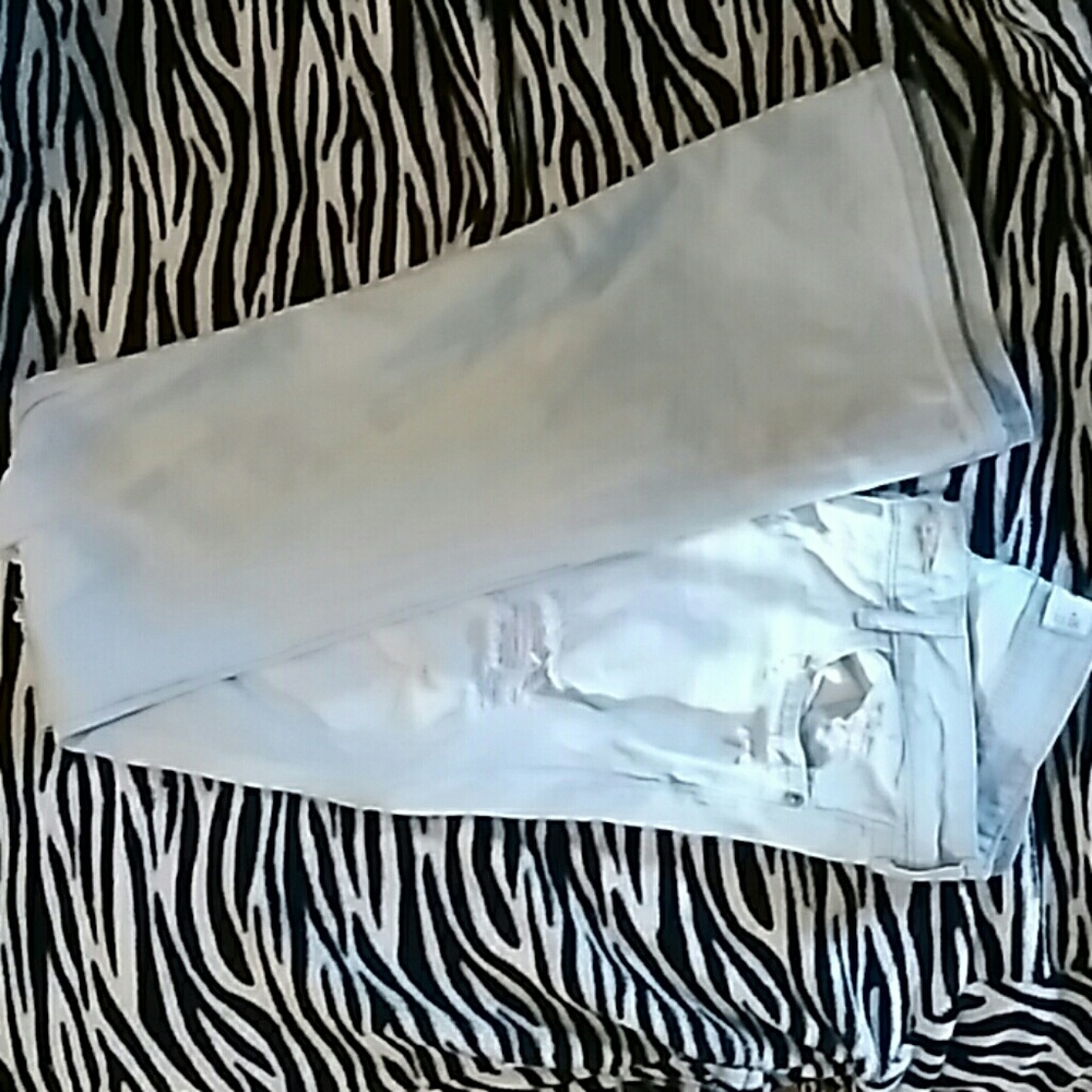 Light wash Hollister destroyed blue jeans