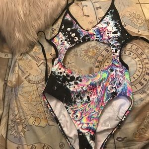 Ravewithmigente acid bath bodysuit.