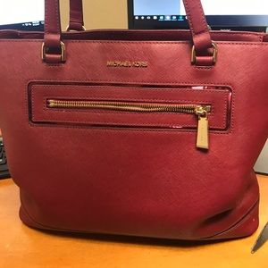 Red Michael Kors handbag
