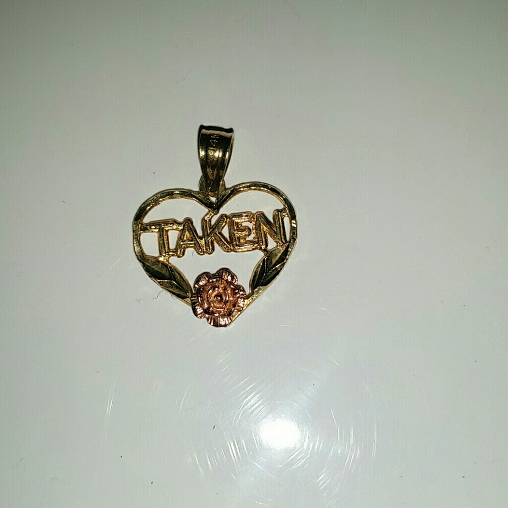 Taken necklace pendant