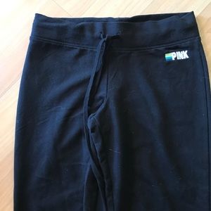 Victoria's Secret pink flare pants.