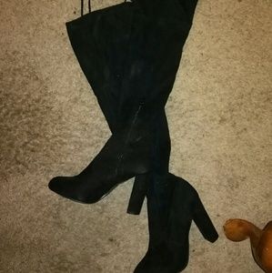 Knee High felt boots, zip up with tie at the top.